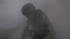 Ukraine -- Rescue workers fighting fire in Sumy region after a Russian strike, 15May2025 
